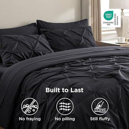 Bedsure Oversized King Comforter Set Black - Bed in a Bag Bedding Set 7 Pieces, GentleSoft™ Pintuck Bed Set Gift for Family, Pinch Pleat Black Comforter with Sheets, Pillowcases & Shams
